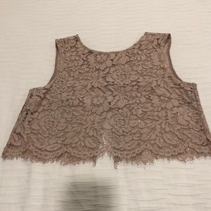 Lace shirt with eyelash fringes on bottom, great open lower back!!